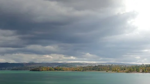 Stormy clouds over mountain lake Stock Footage 80997083