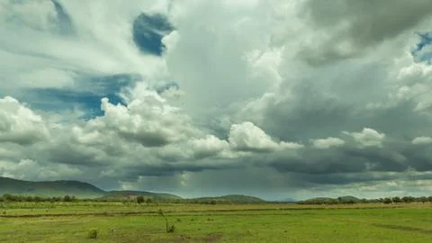 Stormy clouds over the mountains Stock Photos