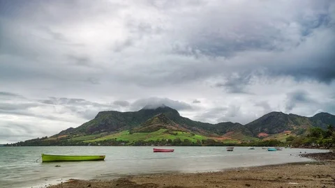 Stormy clouds over volcanic tropical island timelapse Stock Footage 72699741
