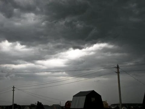 Stormy clouds in the sky. The concept of bad weather. Stock Photos
