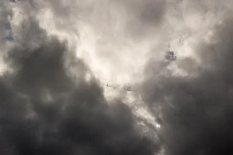 Stormy clouds with the sun Stock Photos