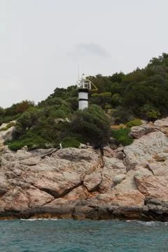 Stormy cloudy day. Dramatic sky and huge waves at the Lighthouse Stock Photos