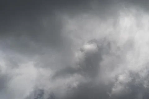Stormy cloudy sky. Dark clouds fill overcast sky. Gloomy storm clouds domin.. Stock Photos