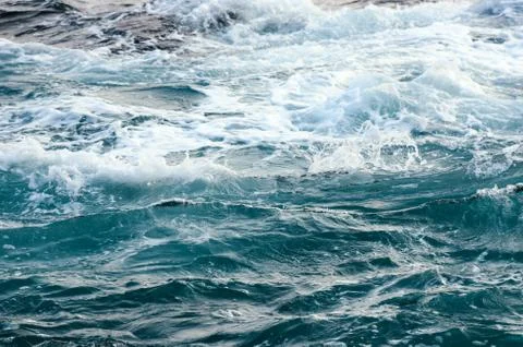 Stormy dark sea. Deep blue water from top view. Stock Photos