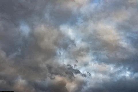 Stormy dark sky with clouds. Stock Photos