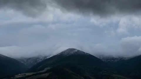 Stormy dark winter clouds mountain landscape timelapse Stock Footage 145578290