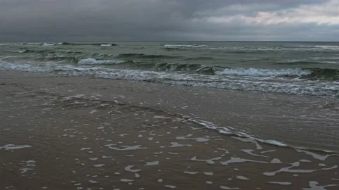 Stormy day by the Baltic sea. Empty beach during bad weather. Dark gloomy Stock Footage 146520537