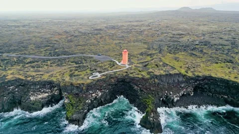 Stormy day at the Svortuloft Lighthouse on a cold autumn day - aerial view Stock Footage 233038078