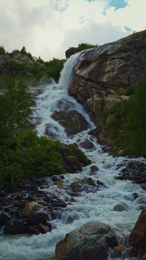 Stormy mountain river among forest Video stock 304322528