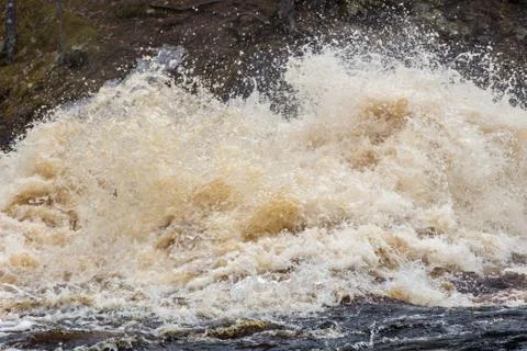 Stormy mountain river with large waves Stock Photos