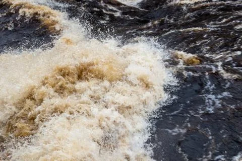 Stormy mountain river with large waves Stock Photos