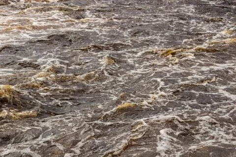 Stormy mountain river with large waves Stock Photos