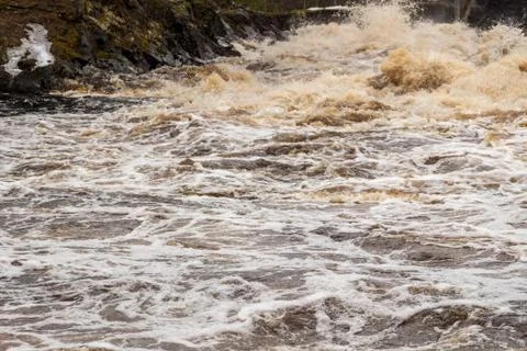 Stormy mountain river with large waves Stock Photos