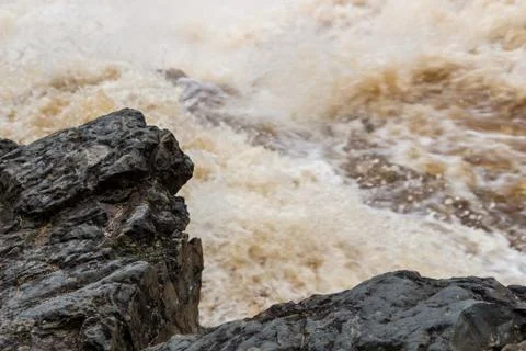 Stormy mountain river with large waves Stock Photos