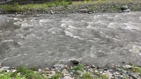 Stormy mountain river. Top view. Beautiful mountain summer landscape Stock Footage 136764224