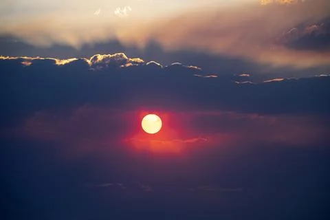 Stormy night cloud. Sunset sky dramatic sunset clouds and sunset sunrays Stock Photos