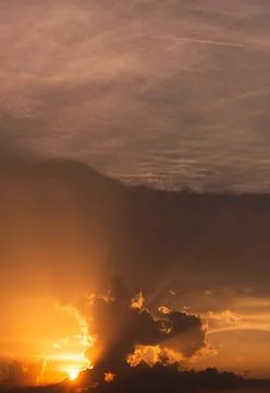 Stormy night cloud. Sunset sky dramatic sunset clouds and sunset sunrays Stock Photos