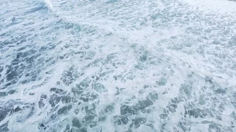 Stormy ocean surface with intense foam Aerial view of white ocean foam textur Stock Footage 322519955
