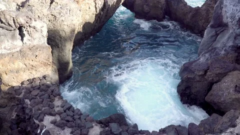 Stormy Ocean Waves is Broken Against The Rocks In The Cave Stock Footage 89393117