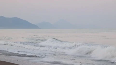 Stormy ocean waves in evening light, close-up Stock Footage 310841946