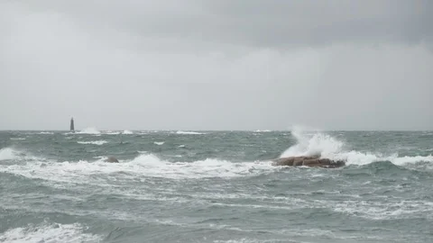 Stormy ocean waves with lighthouse in background - 180FPS Slowmotion HD Stock Footage 120580263