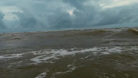 Stormy ocean waves under a dark cloudy sky Stock Footage 344986384