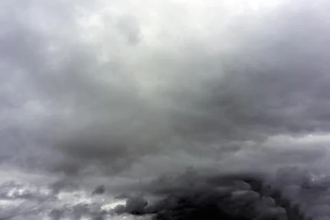 Stormy rain clouds background. Dark sky. Dramatic Moody Thunder Storm. Climat Stock Photos