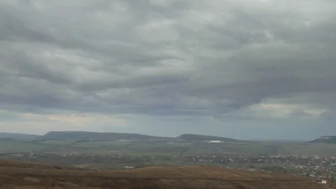 Stormy rain clouds over city Stock Footage 81372957
