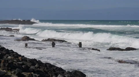 Stormy rocky coastline with choppy seas Stock Footage 59572690