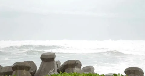 Stormy Rough Sea beach Before Thunder Typhoon Goni, known in the Philippines as 動画素材 334646641