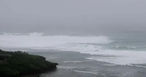 Stormy Rough Sea beach Before Thunder Typhoon Goni, known in the Philippines as 動画素材 334646996