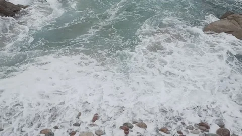 Stormy sea surf on a pebble beach Stock Footage 236644526