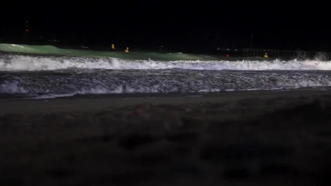 Stormy sea waves on a sandy night beach Stock Footage 301589119