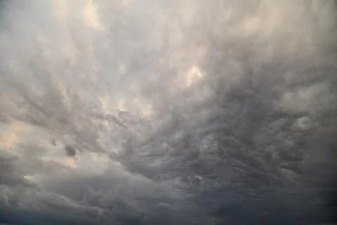 Stormy sky ahead. Dark clouds gather intensively. Foreboding clouds threate.. Stock Photos