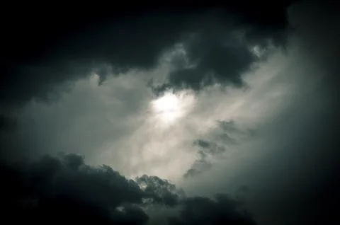 Stormy sky with dark clouds. Abstract nature background. Toned. Stock Photos