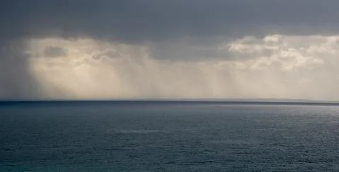 Stormy sky with dramatic clouds and sea. Stormy weather at the ocean 写真素材