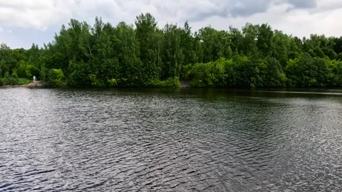 Stormy sky over a lake Stock Footage 341790875