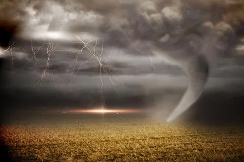 Stormy sky with tornado over field Stock Photos