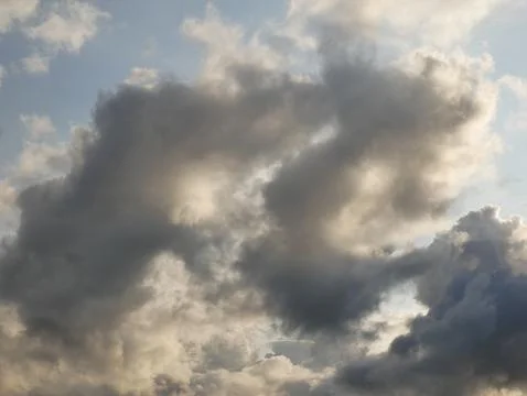 Stormy sky with white and grey clouds background, beautiful sunset heaven photo Stock Photos