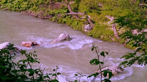Stormy stream of water with splash from a waterfall at a hydroelectric stat.. Stock Footage 234981925