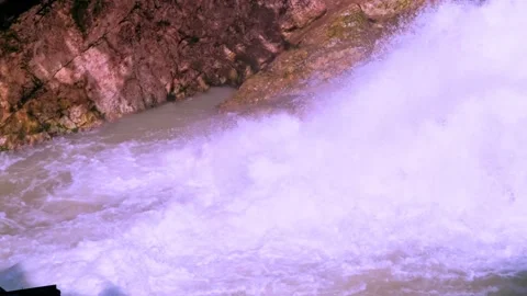 Stormy stream of water with splash from a waterfall at a hydroelectric stat.. Stock Footage 234982232