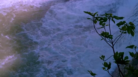 Stormy stream of water with splash from a waterfall at a hydroelectric stat.. Stock Footage 234982274
