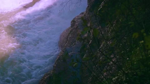 Stormy stream of water with splash from a waterfall at a hydroelectric stat.. Stock Footage 234982506