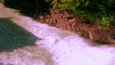 Stormy stream of water with splash from a waterfall at a hydroelectric stat.. Stock Footage 234982853