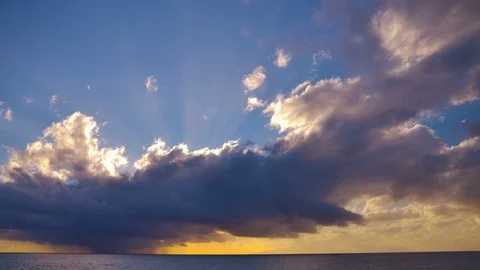 Stormy sunset clouds run over sea nature landscape time-lapse Vidéo 105776048