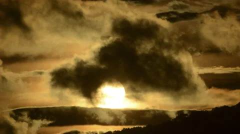 Stormy sunset time lapse with cloud and sun silhouettes 4K version Stock Footage 40541047