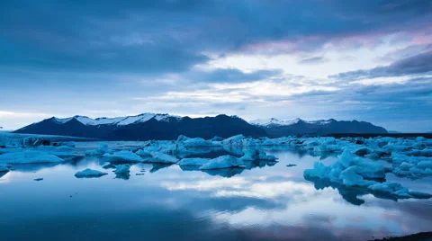 Stormy Sunset Time Lapse with Drifting Icebergs.  Stock Footage 52423211