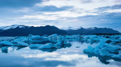 Stormy Sunset Time Lapse with Drifting Icebergs.  Stock Footage 52423345