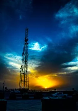 Stormy sunset tower Stock Photos