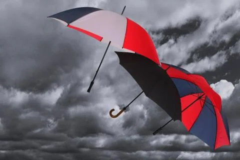 Stormy umbrellas Stock Photos